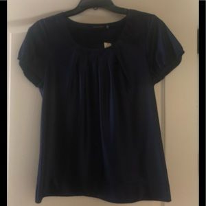 The limited Small Shiny Blue Blouse.